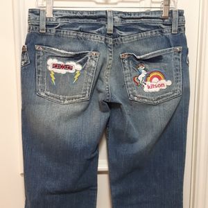 Flared jeans with embroidered patches